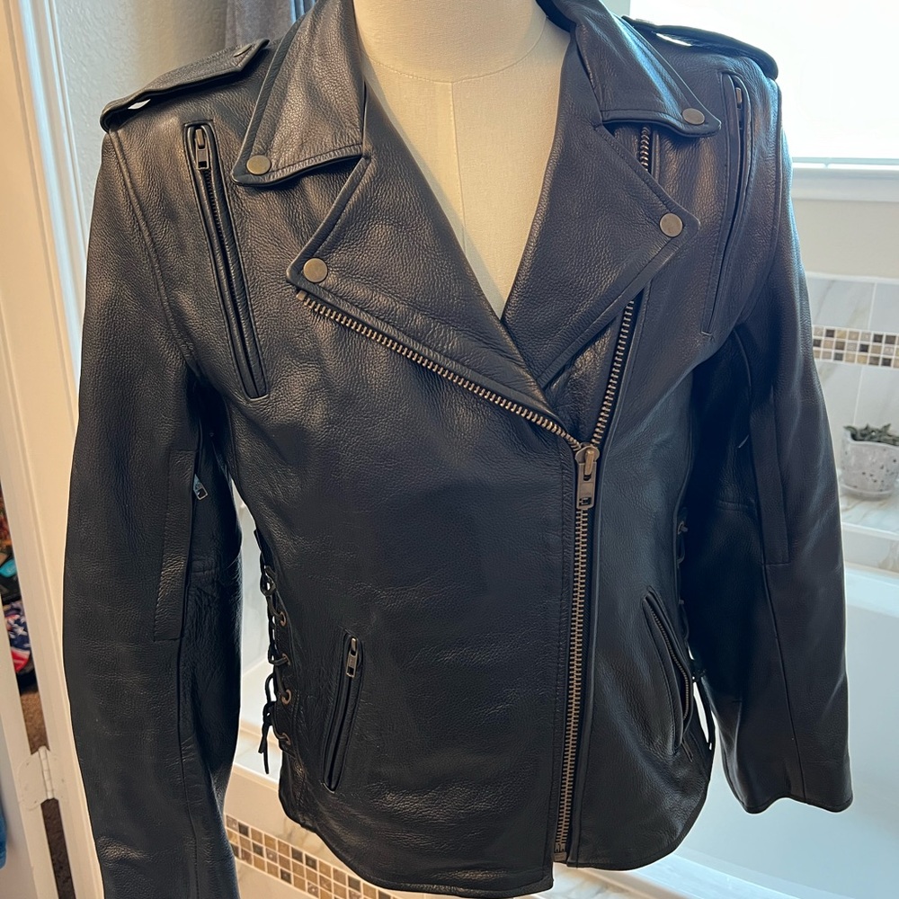 Black heavy leather riding jacket for women.
